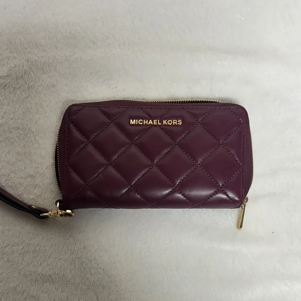Michael Kors Plum Quilted Wristlet/ wallet